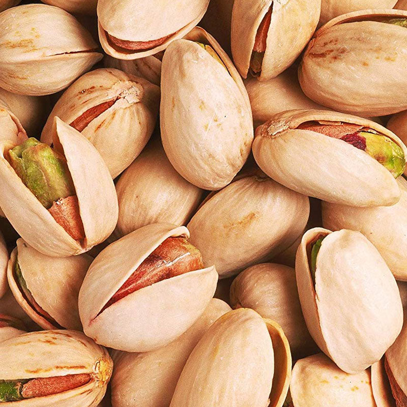 Close-up of pistachios with shells