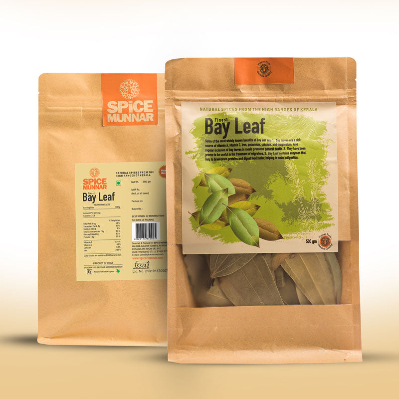 Two brown paper bags with Spice Munnar branding and labels for bay leaf  