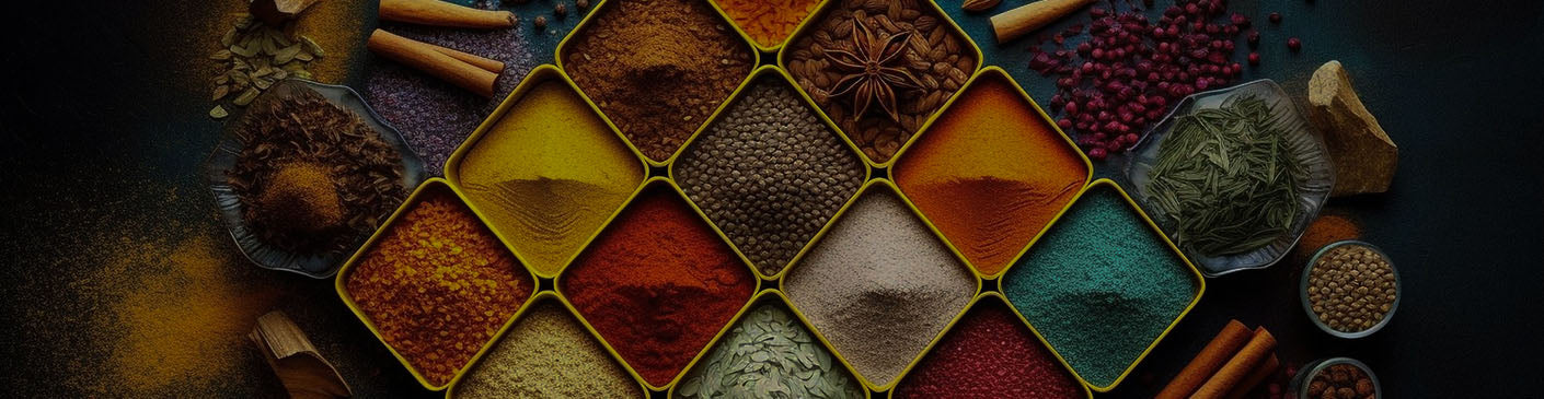 Assorted Munanr spices in small containers arranged in a diamond pattern  