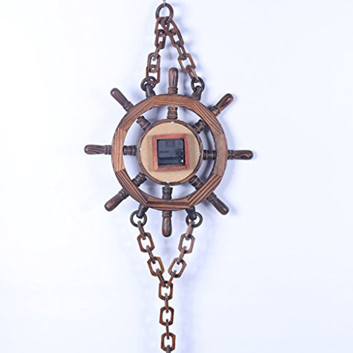 Wooden ship's wheel with chains  